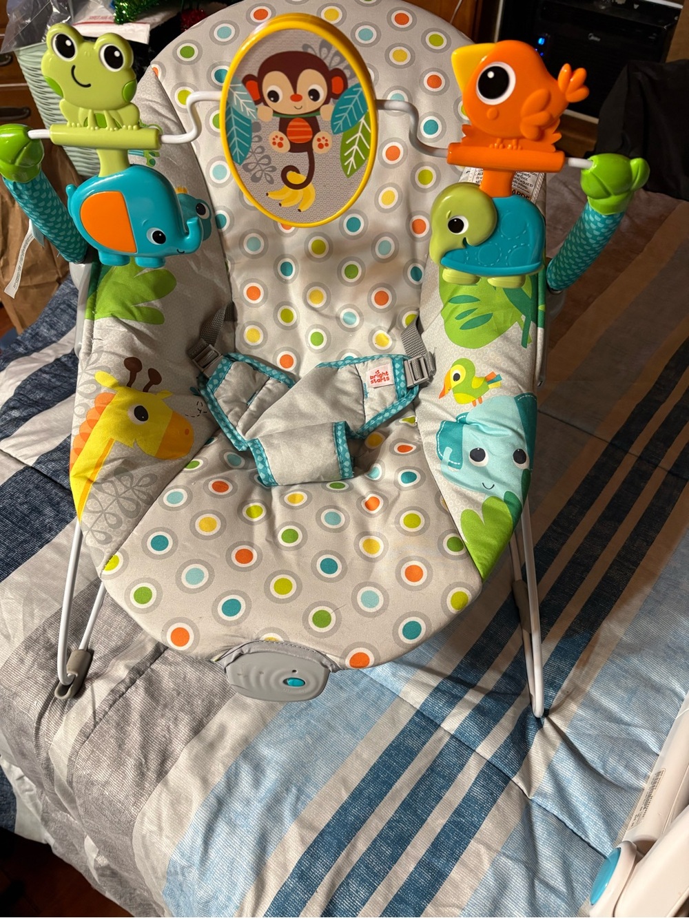 Gray Polka Dot Baby Bouncer with Colorful Animal Toys